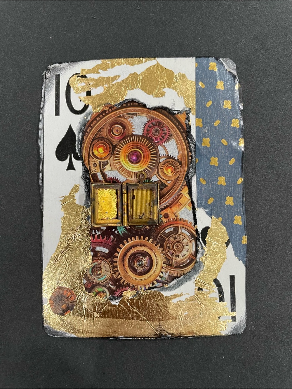 Steampunk locket art on playing card
